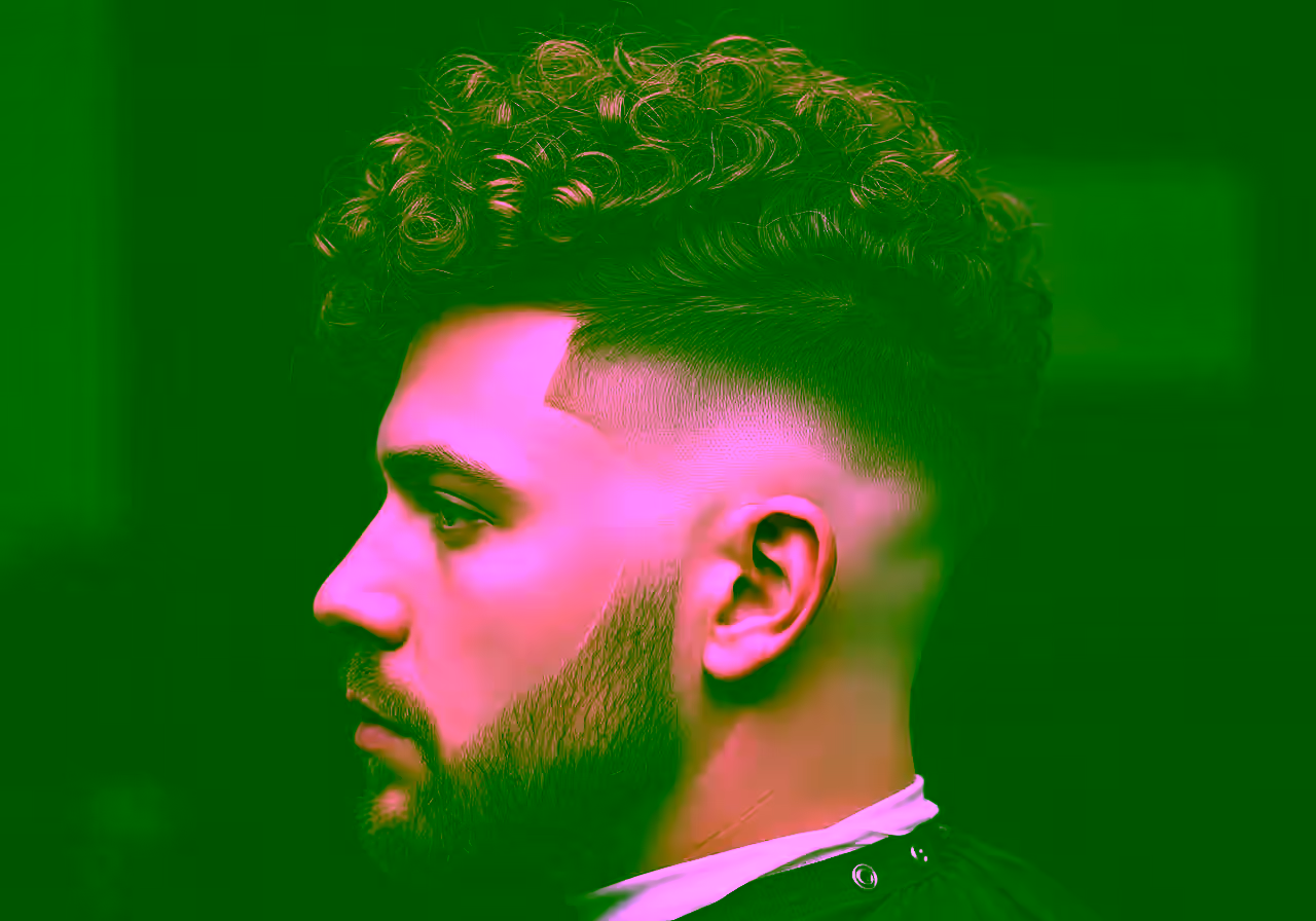 Curly Burst Fade — curly hairstyle for men in 2026