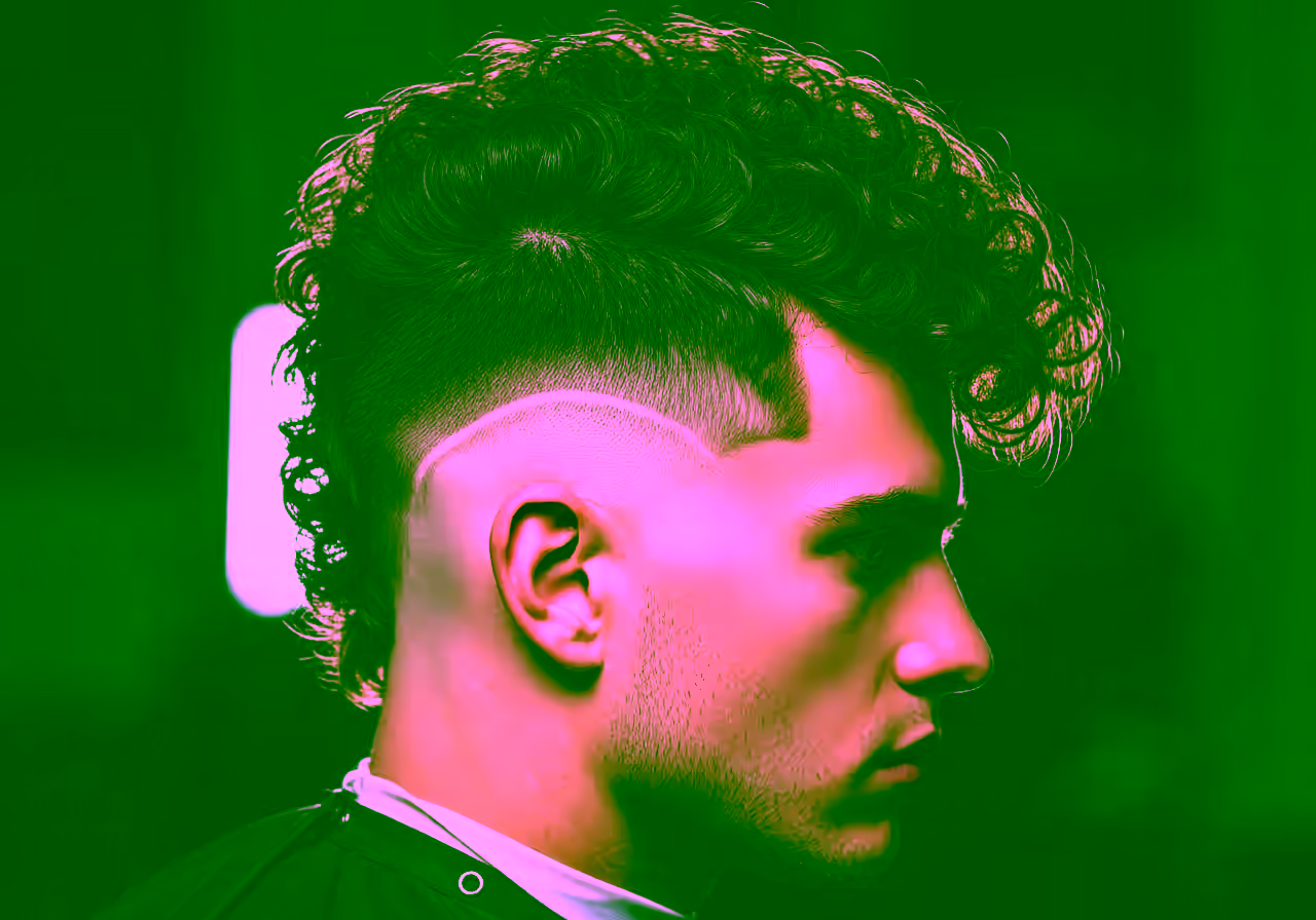 Curly Faux Hawk — curly hairstyle for men in 2026